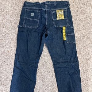 Brand new never worn lee carpenter jeans.